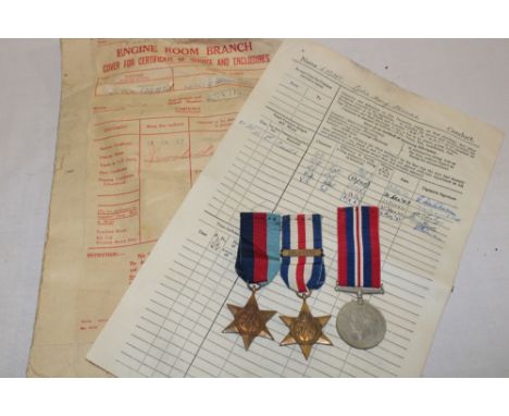 A 1939/45 star, France and Germany star with Atlantic bar and a 1939-45 War medal awarded to L.H.T. Light, Royal Navy with or