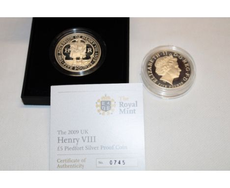 A 2009 Henry VIII commemorative £5 Piedfort silver proof crown, cased with certificate and a 2008 Elizabeth first commemorati