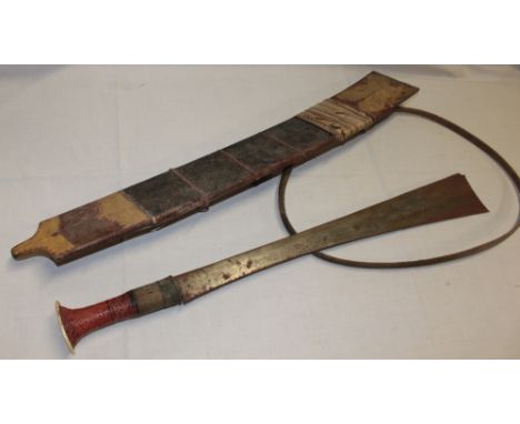 An Eastern-style sword with 22" broad single-edged blade and lacquered and brass hilt in bamboo scabbard