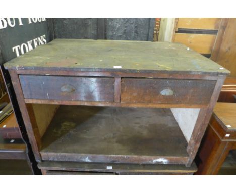 A pine two drawer work bench 