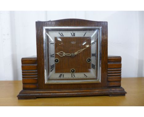 A  Smiths Enfield oak mantel clock 