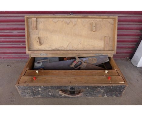 A carpenter's tool chest and tools 