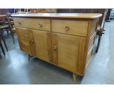 An Ercol Blonde sideboard 