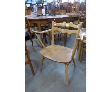 An Ercol Blonde elm and beech 493 model chair 