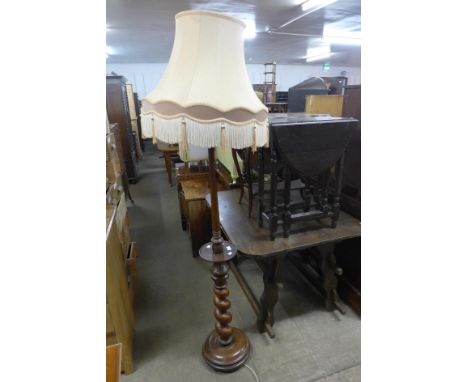 A walnut barleytwist standard lamp 