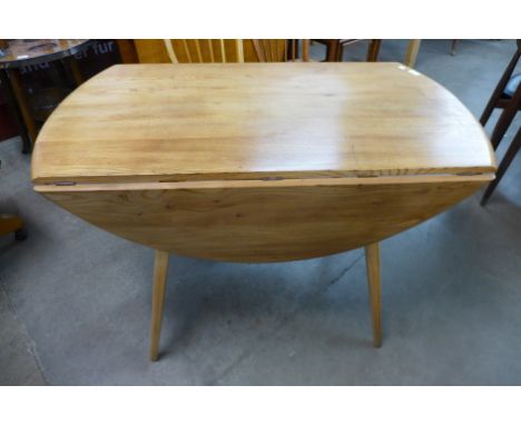 An Ercol dropleaf table 