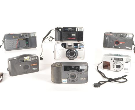 A collection of vintage late 20th century compact point and shoot 35mm film cameras. The collection featuring seven examples,
