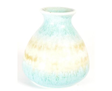 Ruskin - 1932 studio art pottery vase. Small vase in a blue and cream colourway glaze with a bulbous base tapering up towards