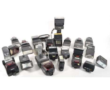 A collection of vintage 20th century camera photo flashes lights. Manufacturers including Sunpak, Nikon, Minolta, Hanimex, Vi