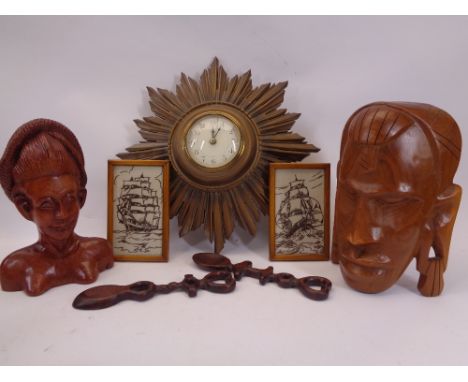 VINTAGE STARBURST WALLCLOCK, carved heads, modern love spoons and two needlework images of clipper boats