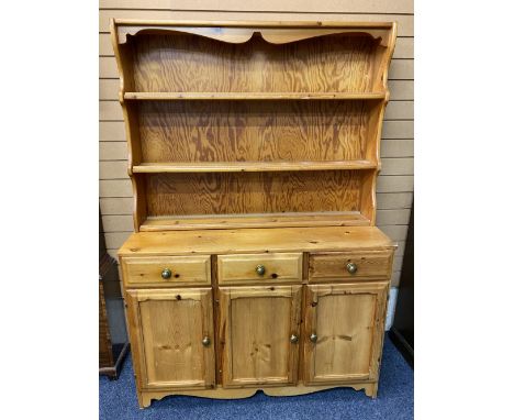 REPRODUCTION PINE KITCHEN DRESSER - having a three shelf rack over a base section of three frieze and three lower cupboard do