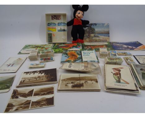 VINTAGE POSTCARDS, CIGARETTE CARDS, TEA CARDS with a small cloth figure of Mickey Mouse