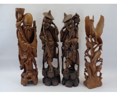 CHINESE &amp; OTHER WOOD CARVINGS (4) - depicting two elderly pipe smoking men, a bearded figure with scroll and an openwork 