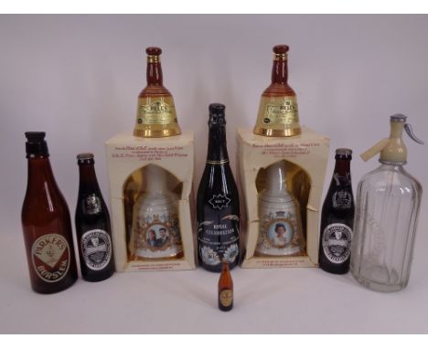 WADE BELL'S SCOTCH WHISKY COMMEMORATIVE BELLS &amp; BEER BOTTLES ETC - the large Wade Bells and four of the beer bottles with