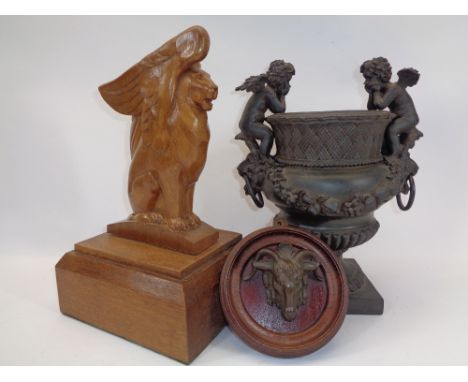 MIXED COLLECTABLES GROUP, 3 ITEMS - a stylised winged lion carved in oak on a stepped base, 35cms H, composition cherubic mou