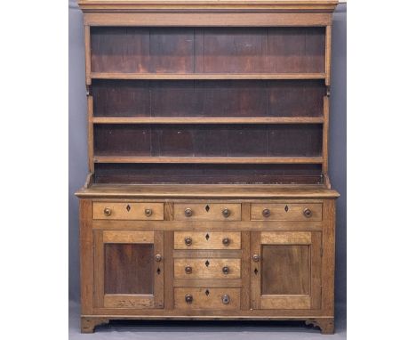 NORTH WALES ANGLESEY OAK DRESSER CIRCA 1850 - with shaped detail to the rack sides and wide back boards to a three shelf rack