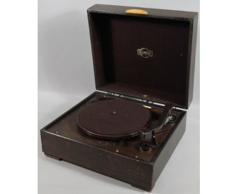 Two Wharfedale speakers, 32cm high, and a Marconiphone table top record player with baize lined turntable, in polished case. 