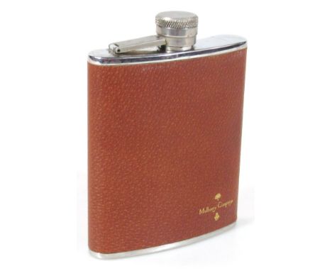 A Mulberry Company chrome plated hip flask, with textured brown leather finish centre with further marks beneath, in stainles