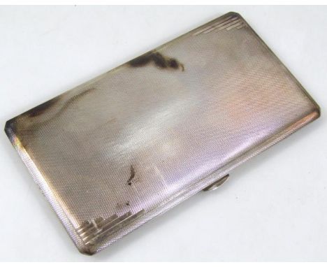 A George VI silver cigarette case, of rounded part engine turned outline, engraved to the interior 1958, Birmingham 1947, 16c
