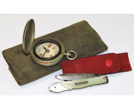 A silver and mother of pearl pen knife, with shaped handle and blade and a compass. (2)