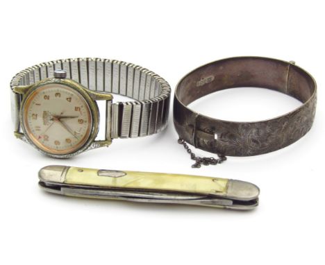 A silver bangle, partially chased with flowers, 5cm wide, 1½oz, a Roamer gentleman's wristwatch and a fruit knife with long a