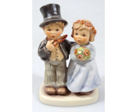 A boxed M J Hummel Goebel figure, Dearly Beloved, 9cm high, with outer packaging.
