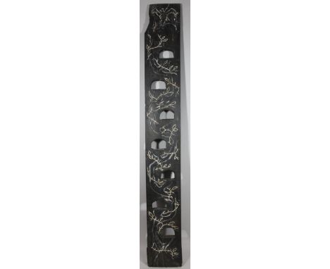 An unusual wooden sleeper Jacob's Ladder panel, pierced and engraved and highlighted in white, with birds, leaves and entwine