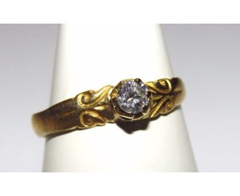 An 18ct gold diamond solitaire ring, size J1/2.