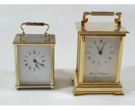 A modern Fax & Simpson carriage clock, of rectangular outline, with swing handle, 7cm wide, Roman numeric dial, on compressed