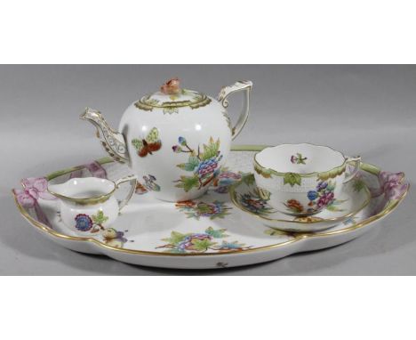 A 20thC Herend of Hungary part tea service, comprising tray, teapot 604/VB 6, 15cm high, cup, saucer and milk jug, each piece