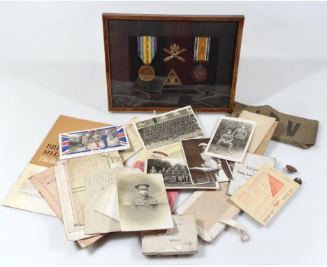 A quantity of war related ephemera items, field service postcard, a quantity of ARP air raid patrol and other buttons, Home G