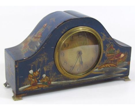 An early 20thC blue Japanned mantel clock, the scroll case set with 8cm dia. dial revealing key wind movement raised with ori