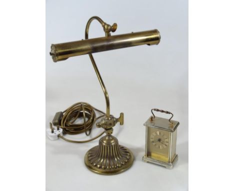 A mid-20thC brass club style desk light, with a scroll stem, cylindrical top and shaped base, 41cm high, and a modern Acctim 