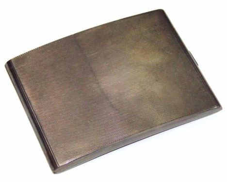 A George V silver cigarette case, of curved engine turned outline, with thumb mould clasp, Birmingham 1925, 11cm wide, 5oz.