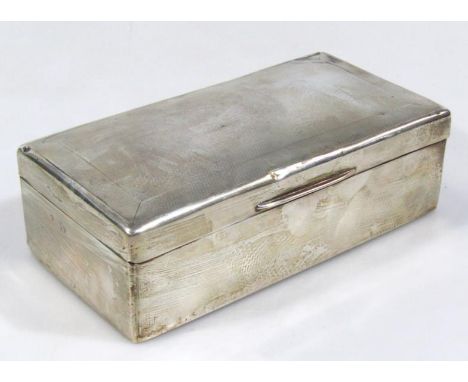 A 20thC silver cigarette box, the hinged lid partially engine turned, hinging to reveal a fitted cedar lined interior with th