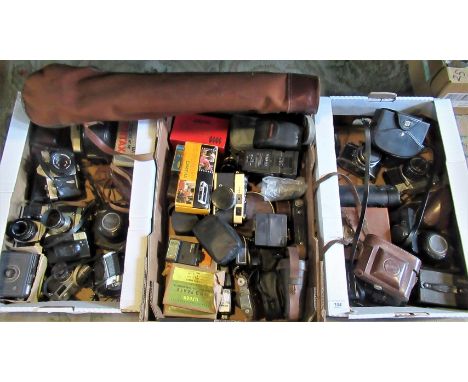 A large quantity of photographic equipment, to include: a Cosina camera, Pentax, Praktica, Konika, various lenses, light mete
