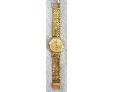 Mido Ocean Star. A power wind 18ct gold gent's wristwatch and strap. Condition Report: 62.2 grams.  Winding and runs.  Back o