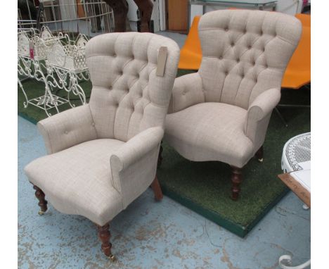 ARMCHAIRS, a pair, button back in neutral fabric on turned castor supports, 67cm W. (2)
