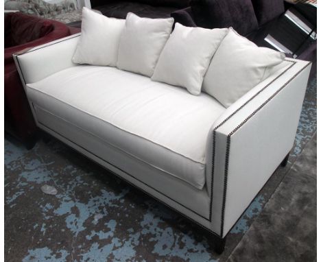 SOFA, two seater, with studded cream upholstery and four matching scatter cushions, 161cm L.