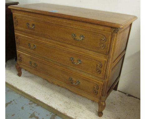 COMMODE, Louis XV style oak with three long drawers below on short cabriole front supports, 111cm W x 81cm H x 48.5cm D.