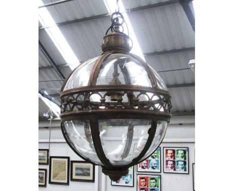 HANGING LANTERN, globe form in a bronzed metal frame, 51cm diam plus chain.