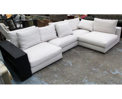 CORNER SOFA, bespoke made, in oatmeal upholstery with feather filled cushions and black end shelf, 195cm x 317cm L.
