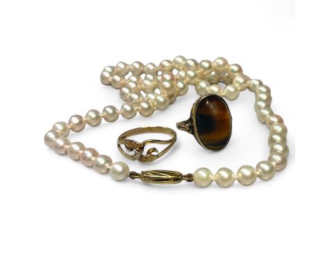 A small collection of jewellery. Comprising a strand of 5.5mm cultured pearls with 375 stamped clasp a diamond set ring in 9c