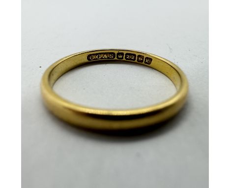 A 22ct gold band ring. Size M. Approximate weight 2.27 grams.