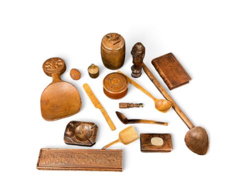 A collection of treen, to include a Mouseman ashtray, a carved seal/pipe tamper and 19th century cooking implements etc (qty)