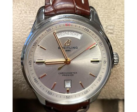 A Breitling Premier Automatic Day and Date 40 Chronometer Wristwatch. Silver dial on a brown alligator strap. Functions inclu