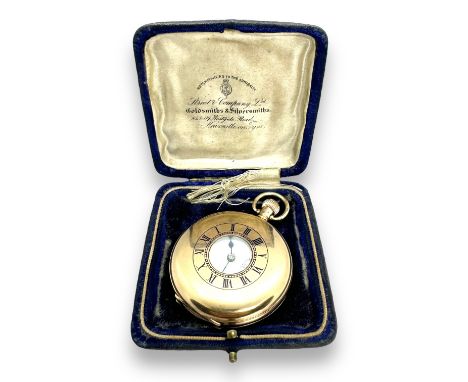 A 9ct gold half Hunter pocket watch. With white enamel dial with black Roman numerals, with secondary dial, to a keyless wind