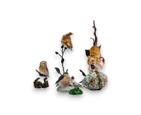 A collection of three bronze and porcelain animals/birds, a Crown Staffordshire bird and an enamel 1975 egg