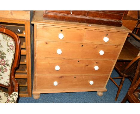 A VICTORIAN PINE CHEST of two short and three long drawers with ceramic knobs,  approximate width 107cm x depth 53cm x height