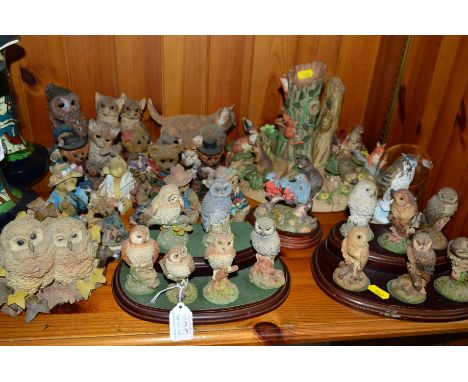 A GROUP OF ORNAMENTS, to include Royal Doulton Natures Heritage collection of six owls, with stand and another of a pair of o